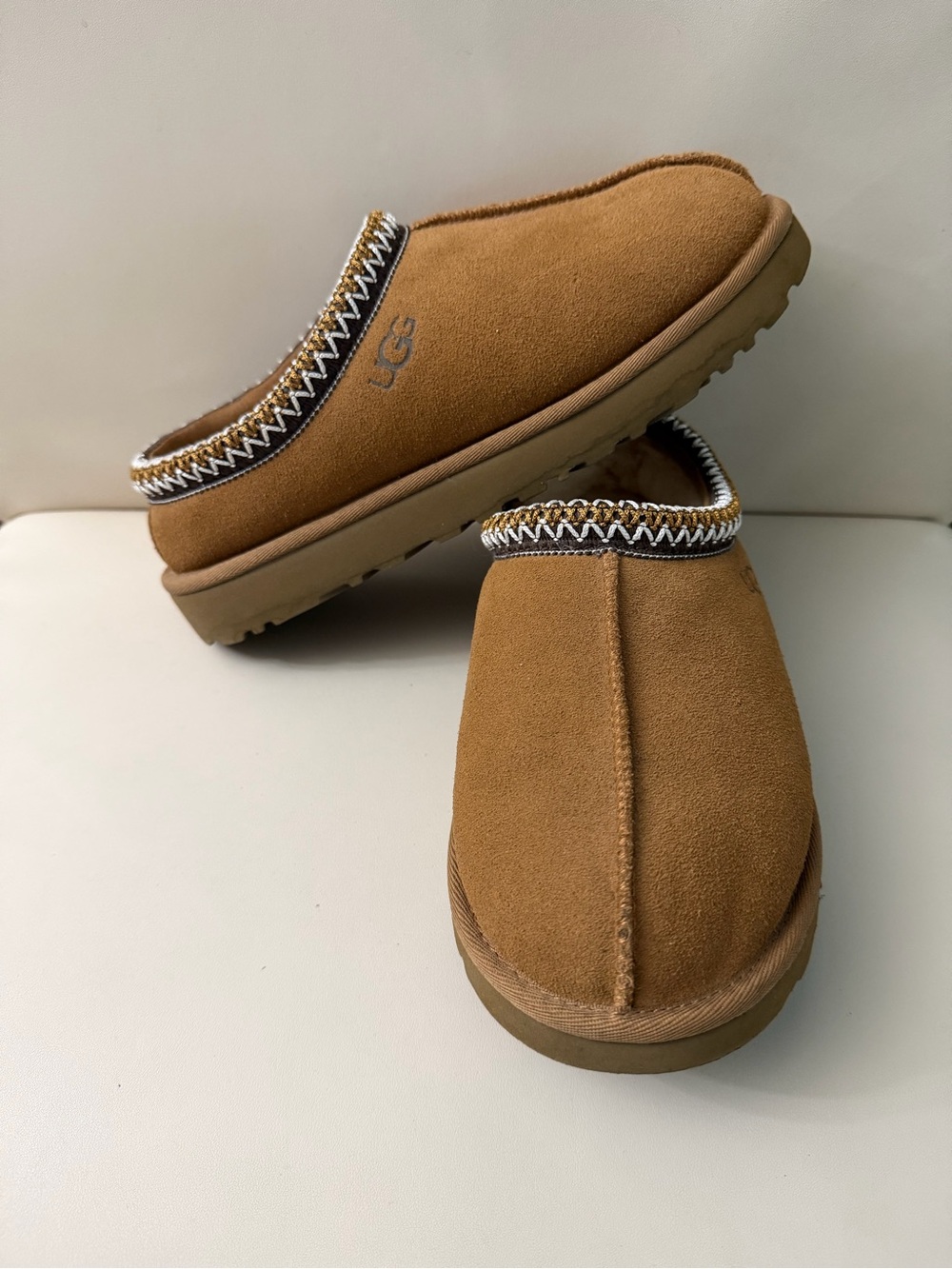UGG women’s Suede Slip-On Loafers in Chestnut Brown
